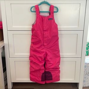 Patagonia 4T pink snow pile bib.  Adjustable straps.  Runs big IMO.